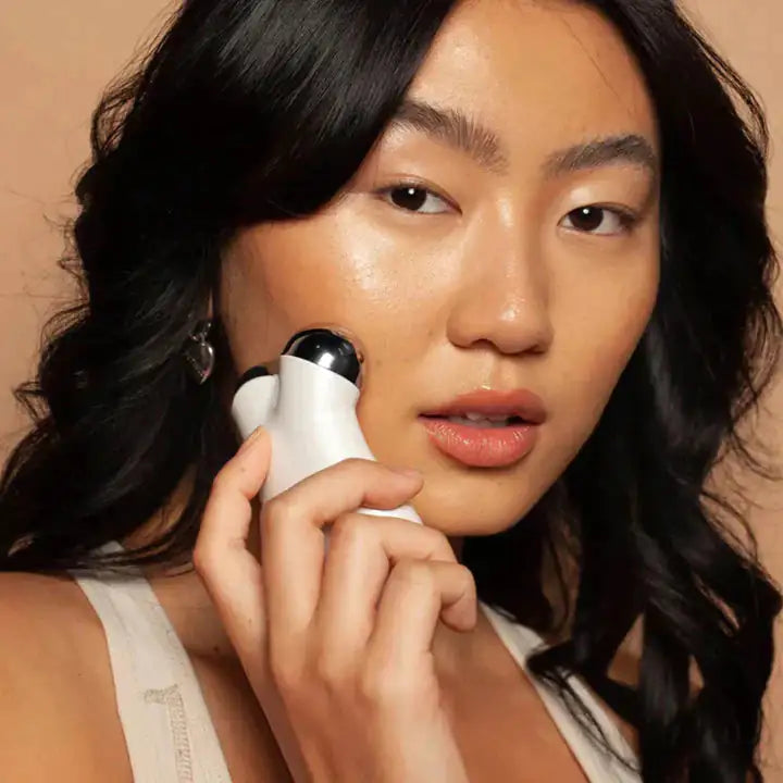Asian Lady using Beauty Microcurrent Facial Toning Massager - DivineLuxes