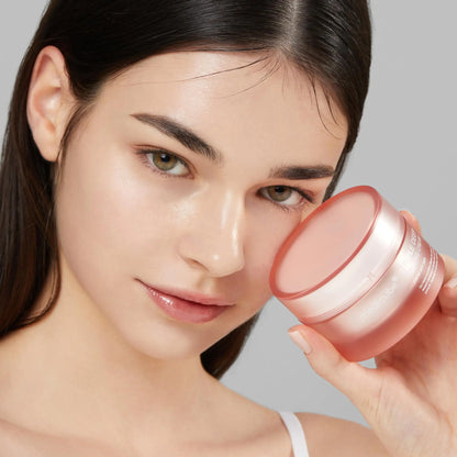 Beautiful clear Skin Lady holding the Medicube Triple Collagen Cream - Hydrating & Firming Moisturizer with Hyaluronic Acid, Premium Elastin, Shea Butter - Wrinkle Care & Boosts Elasticity - Korean Skincare, 1.69 oz - DivineLuxes