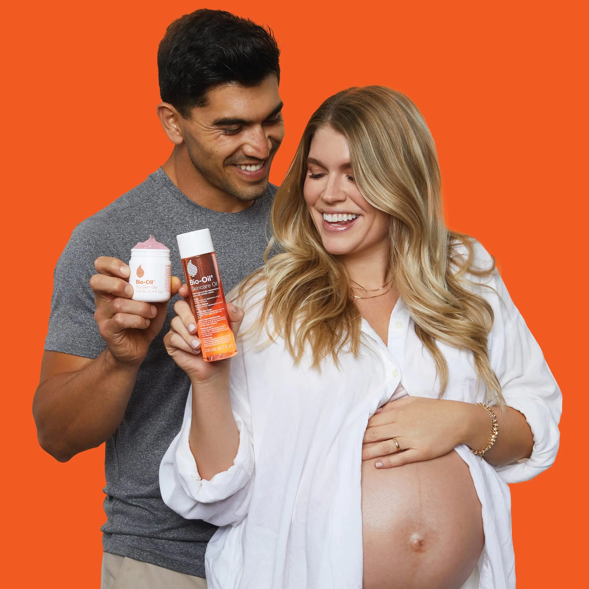 Pregnant couple promoting Bio-Oil Skincare Body Oil, Vitamin E Serum for Scars & Stretchmarks, Dermatologist Recommended, All Skin Types, 6.7 oz 6.7 Fl Oz (Pack of 1) 