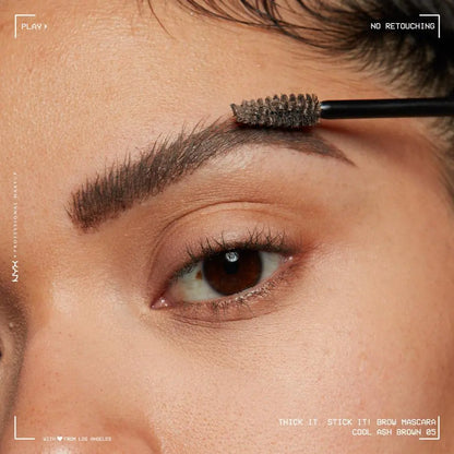Woman Applying NYX PROFESSIONAL MAKEUP Thick It Stick It Thickening Brow Mascara
