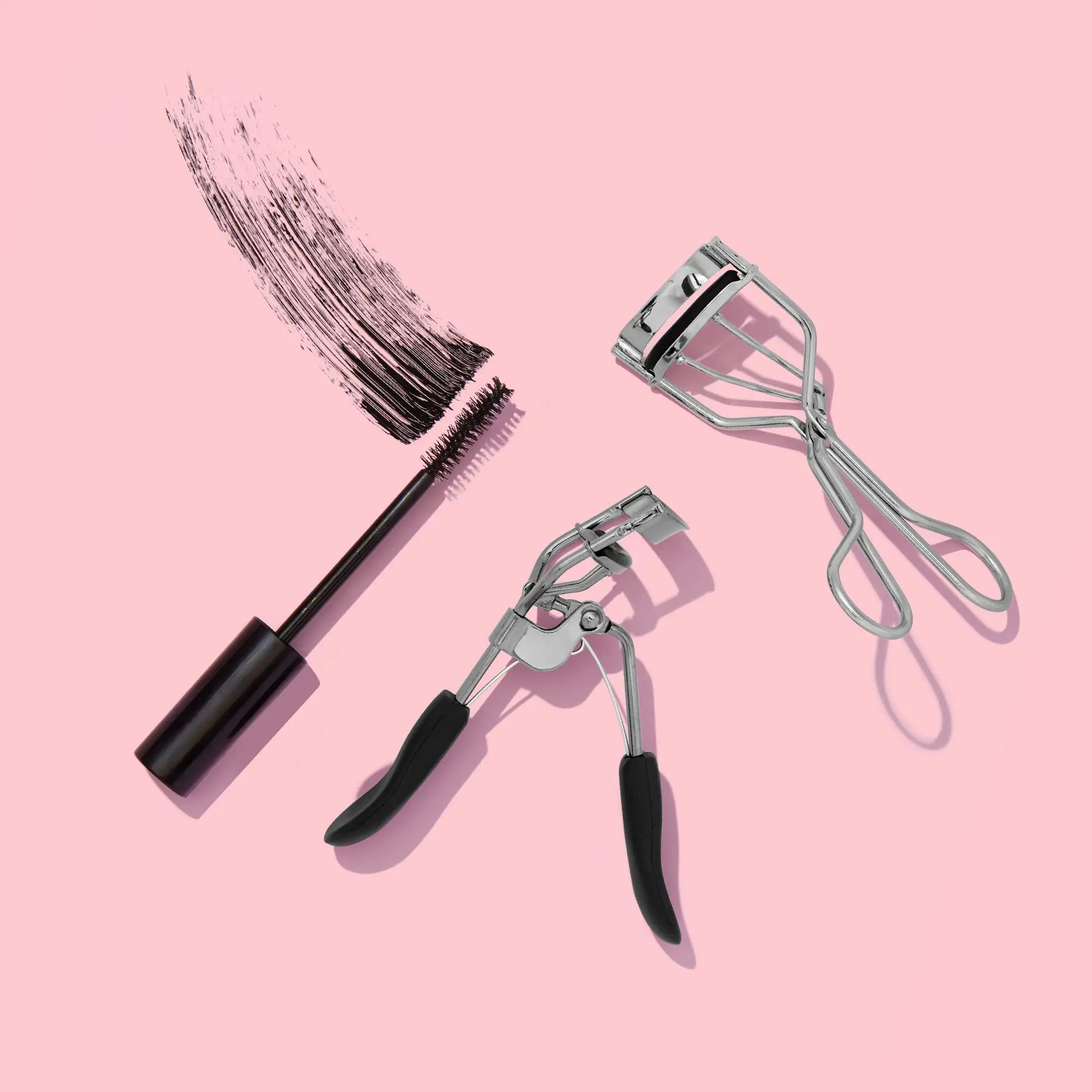 Black and stainless e.l.f. Pro Eyelash Curler, a Vegan Makeup Tool, Creates Eye-Opening & Lifted Lashes, Lash Curler Includes an Additional Rubber Replacement Pad with mascara curler, 
