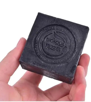 Holding Bamboo Charcoal Handmade Soap
